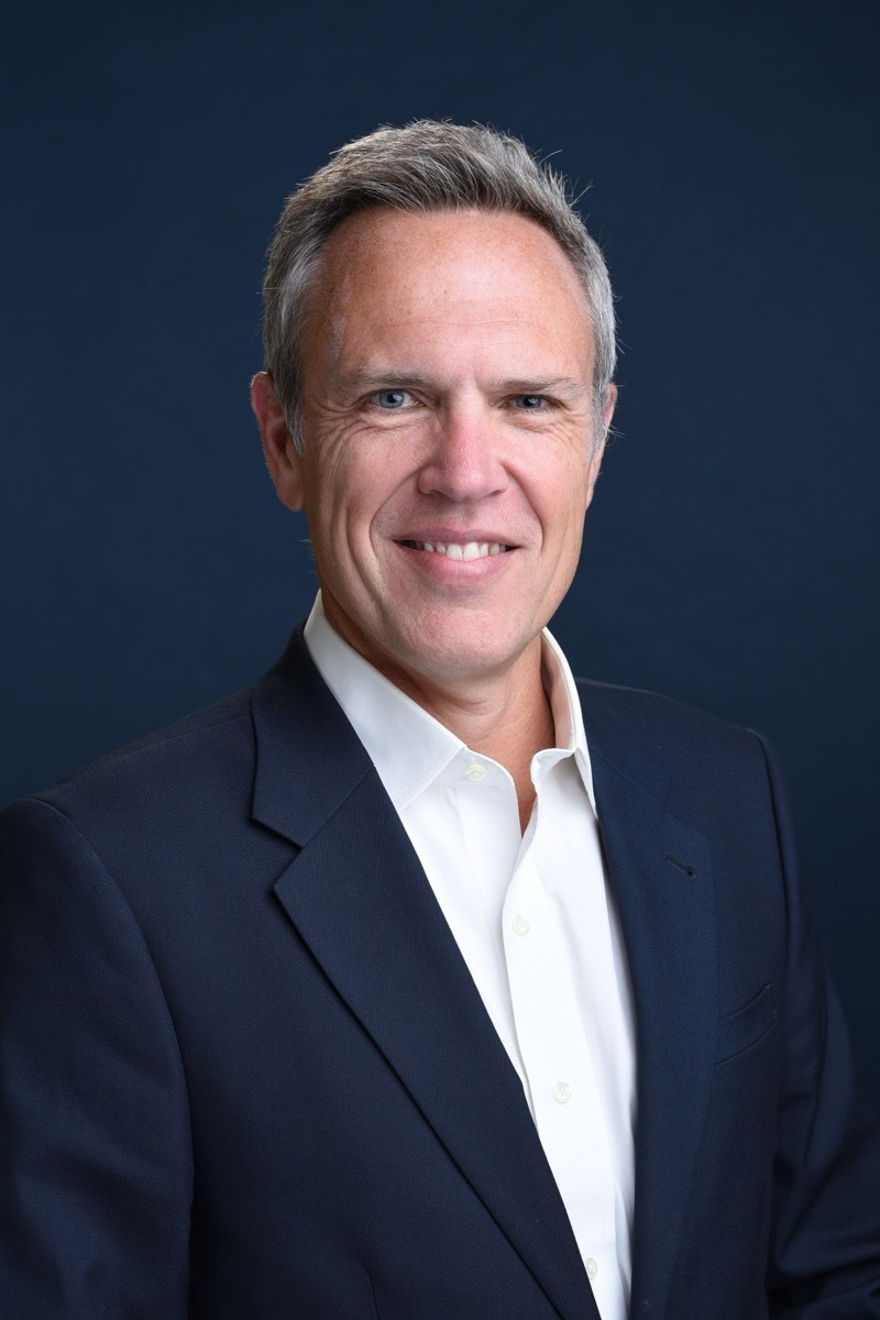 Braydon McCormick in a dark jacket and open-collar shirt